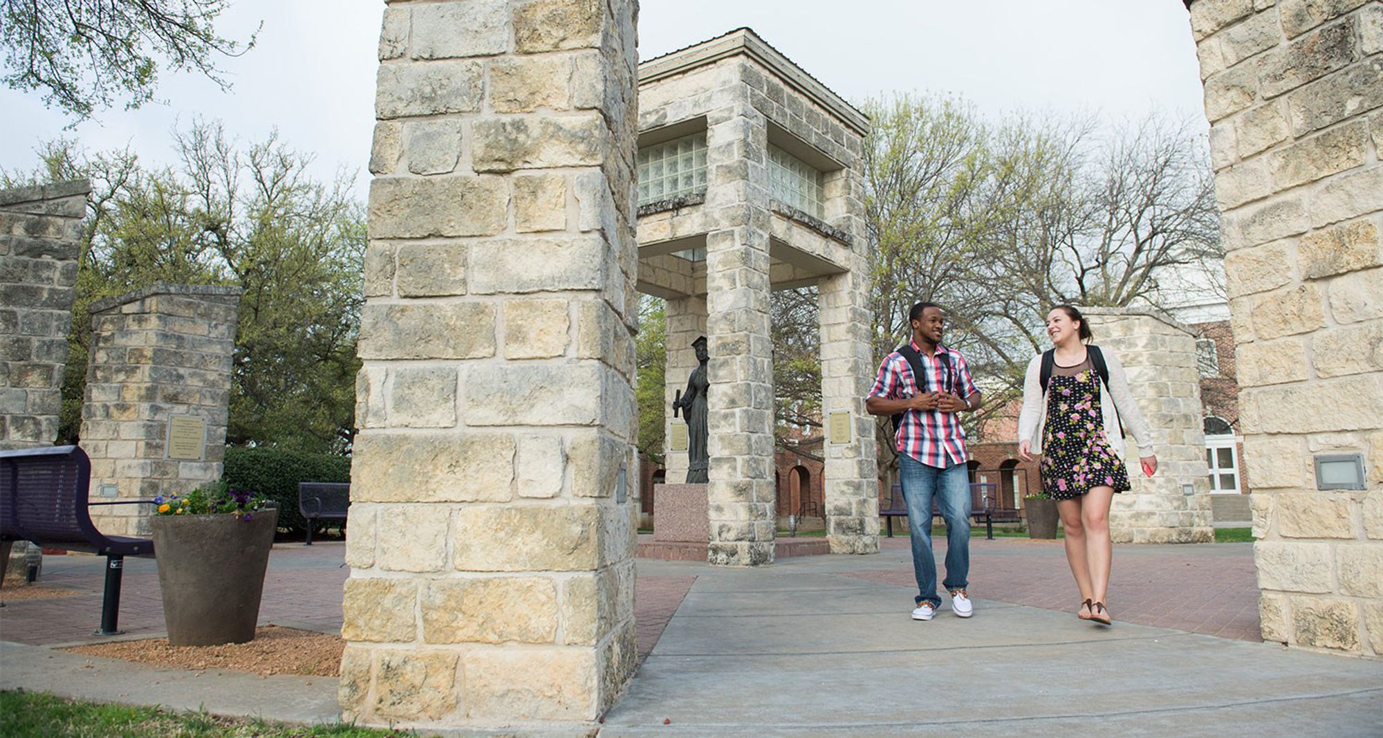 Students walking Forth from Her Portals