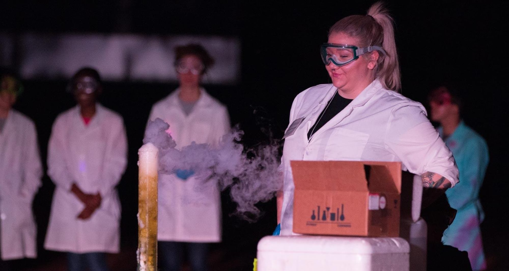 Demos in the Dark event featuring chemical demonstrations set to exciting music