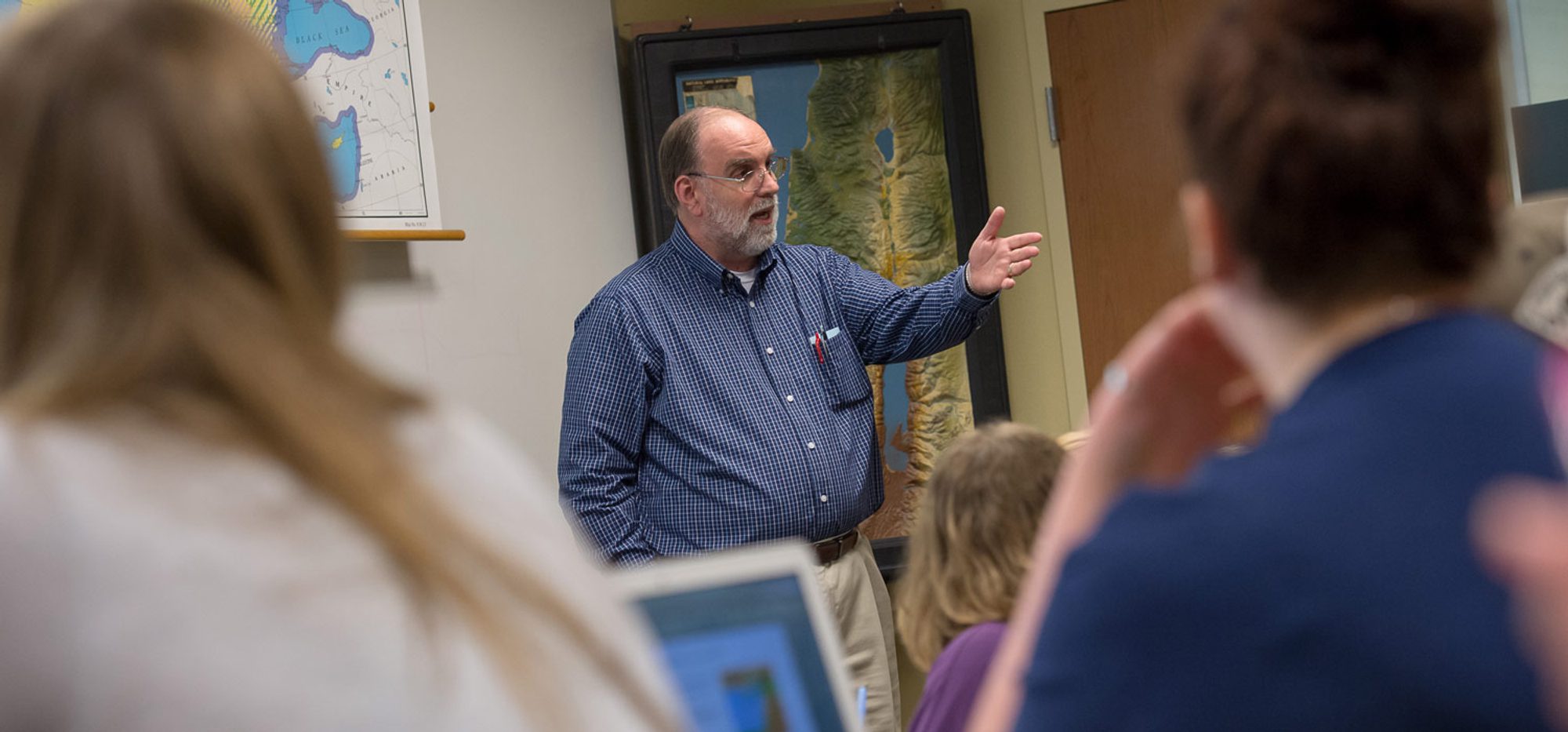 Dr. Carrell, a college of Christian studies professor teaches a class in the Meyer Christian Studies Building. Dr. Carrell, a college of Christian studies professor teaches a class in the Meyer Christian Studies Building.