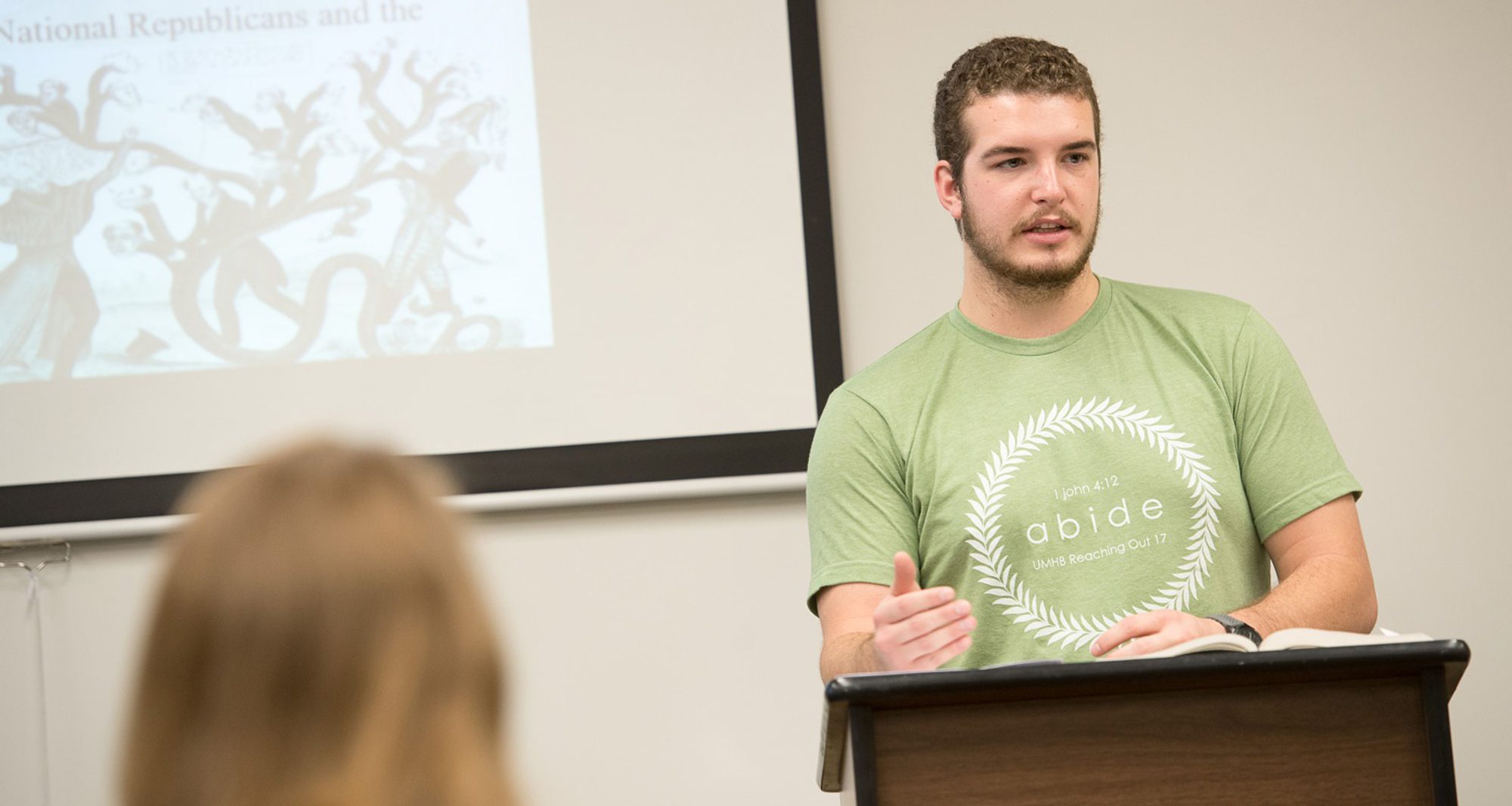 Student giving a speech in class