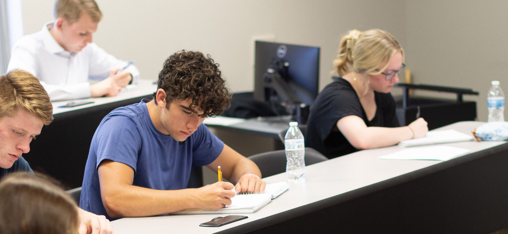 Master of business administration students studying the art of negotiation at UMHB.