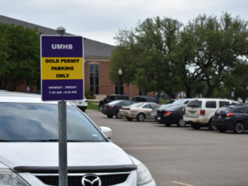 Cars parked in a UMHB parking lot