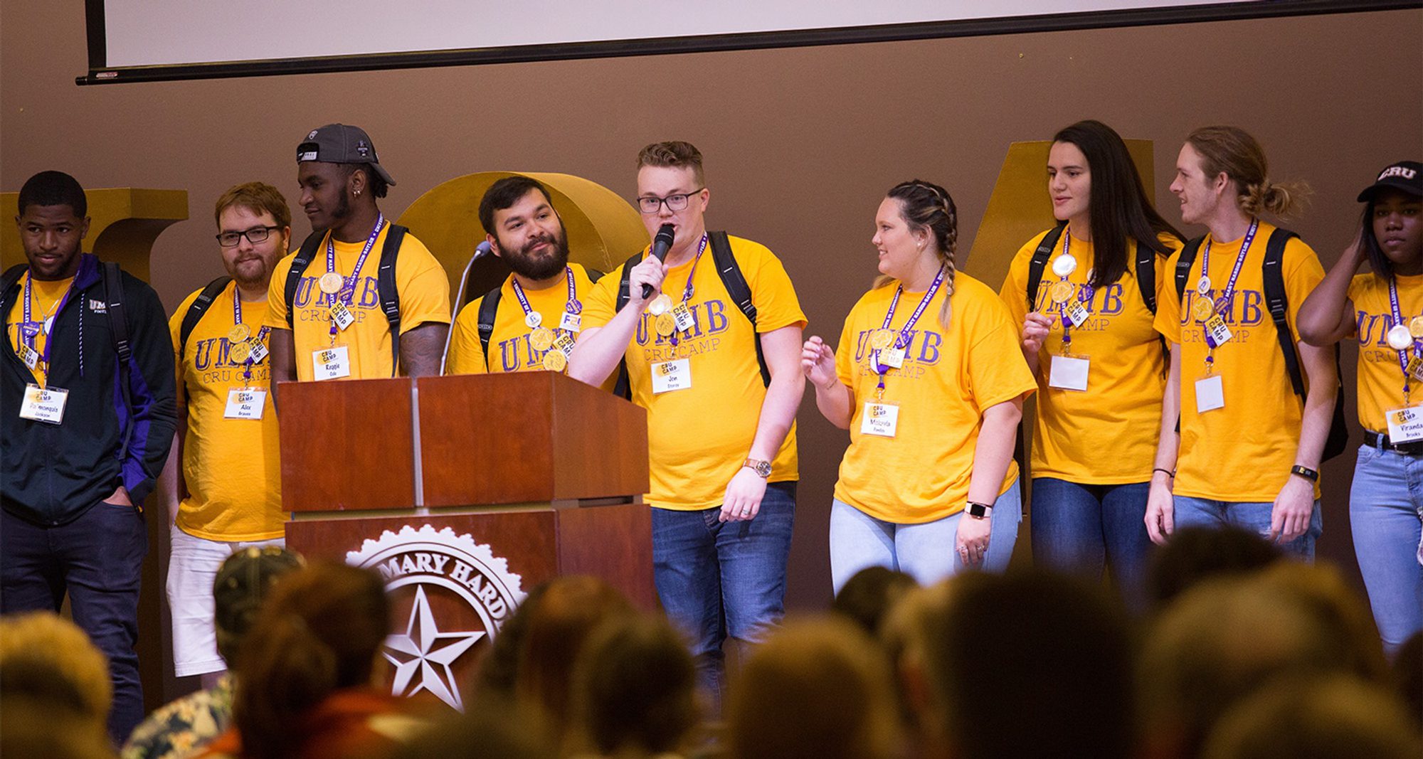 Orientation leaders on stage Orientation leaders on stage