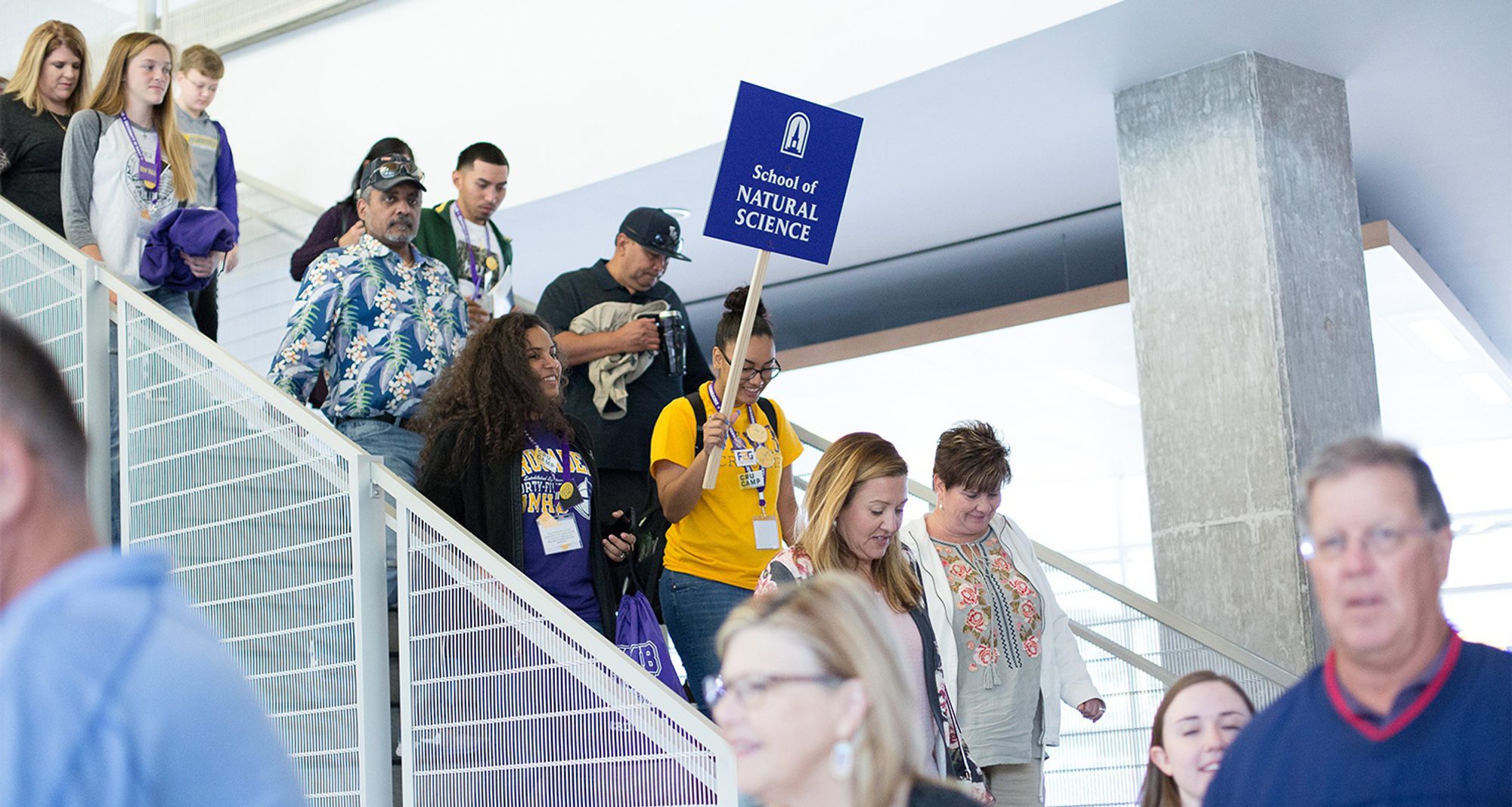 Students walking across campus during orientation