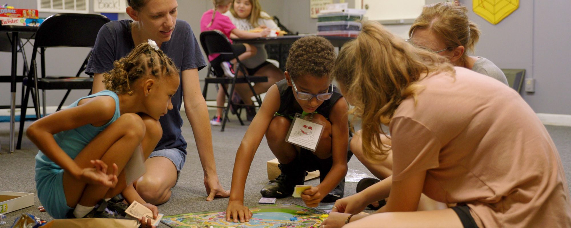 Education advocacy program student at  working with pre-school students.