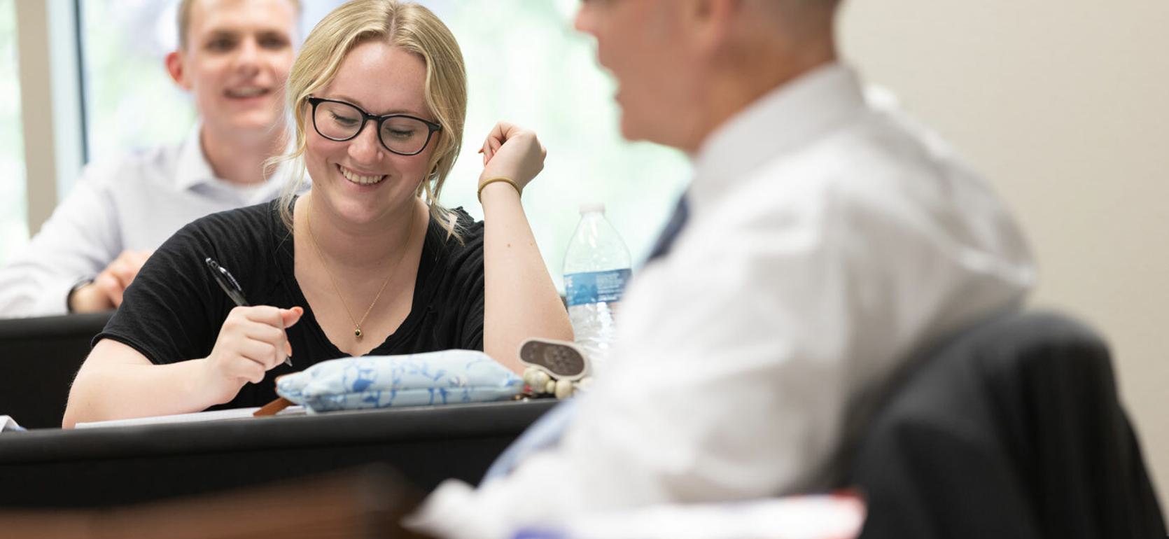 Business Major students listening to professor in classroom at UMHB.