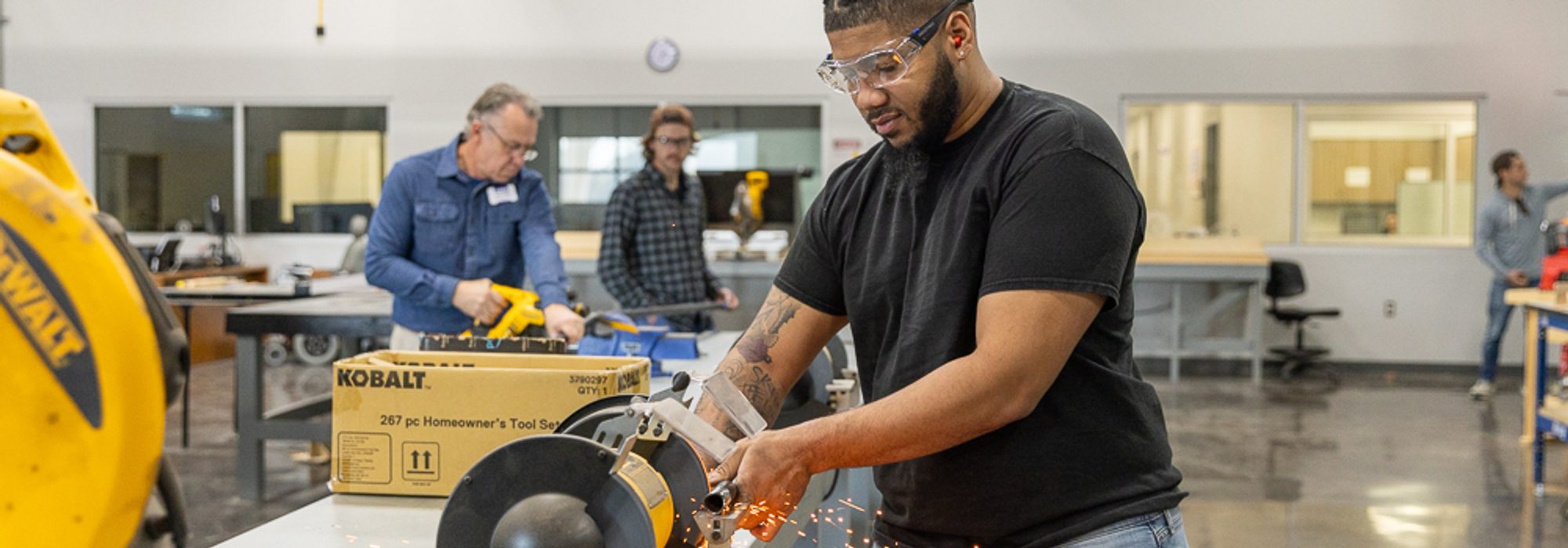 Degree of Engineering student working on mechancial design in egineering lab at UMHB.