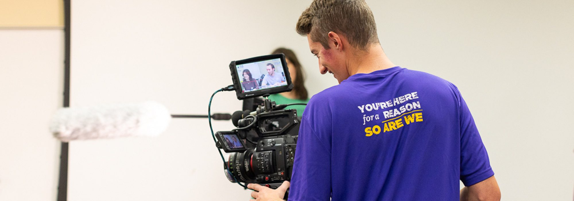 Film Studies student working with camera at UMHB.