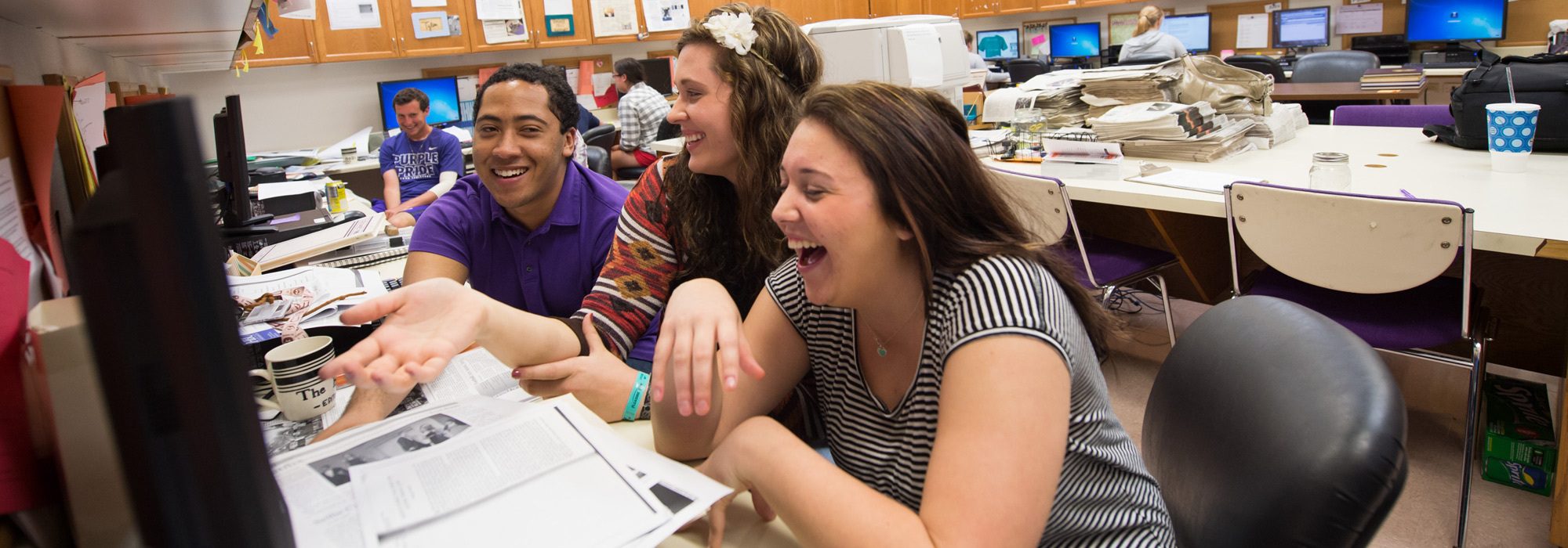 Degree in journalism students creatively crafting photos and news assignment at UMHB.