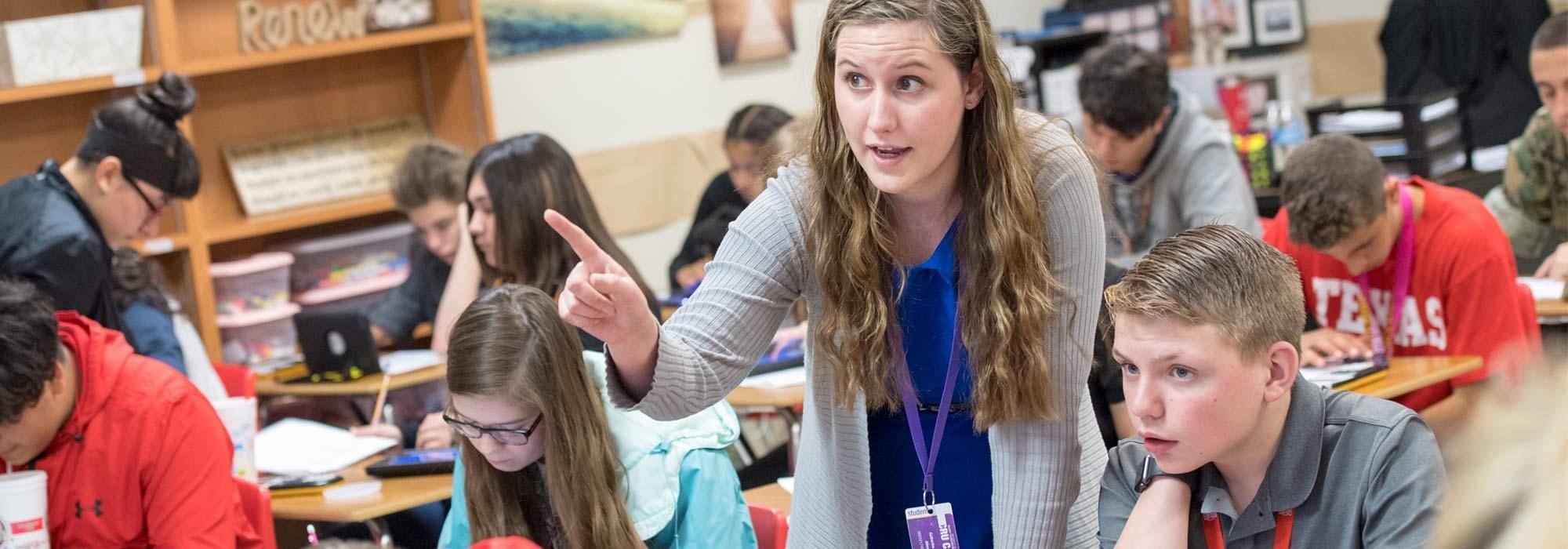 Degree in education student working with middle school students through UMHB teacher education program.