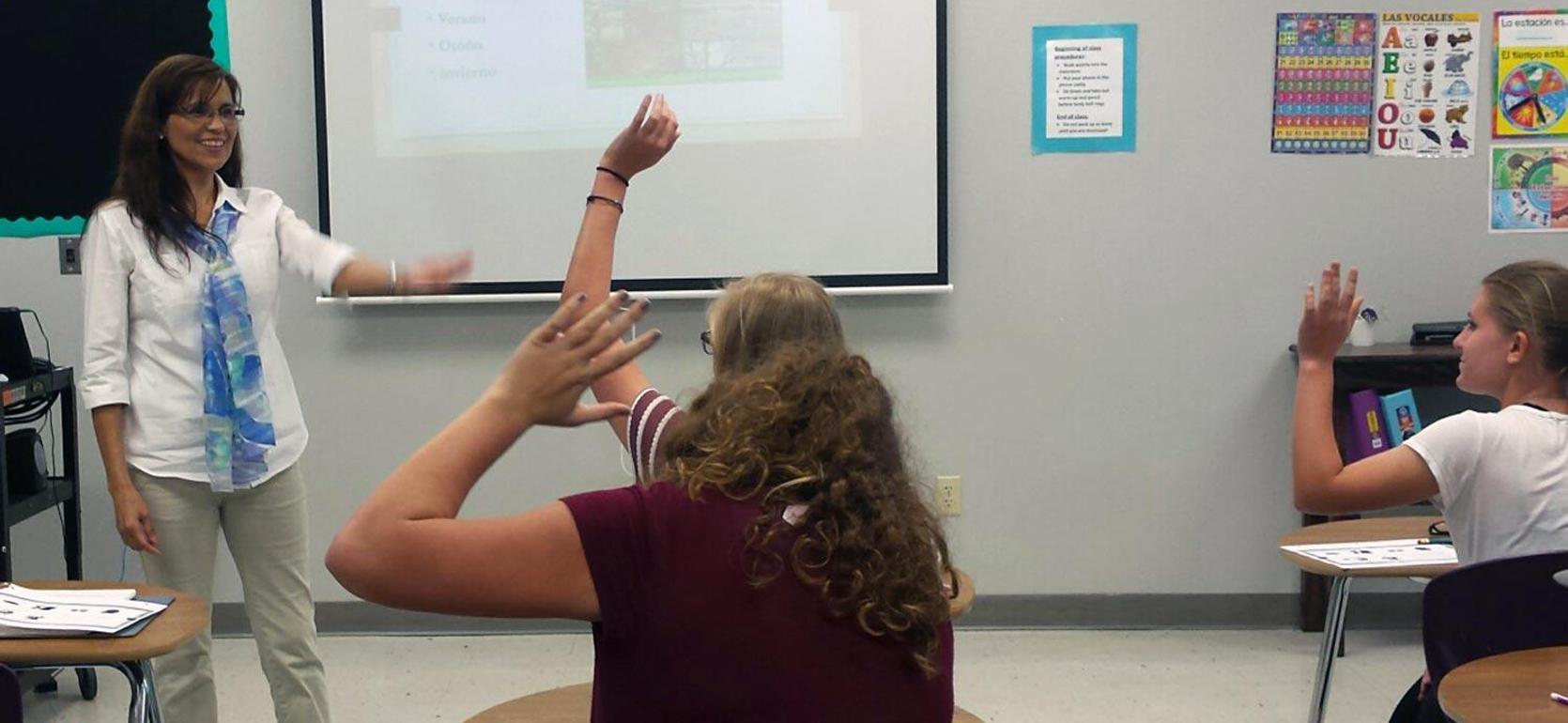 Spanish teacher  who is alum of UMHB is working with students in Holland ISD.