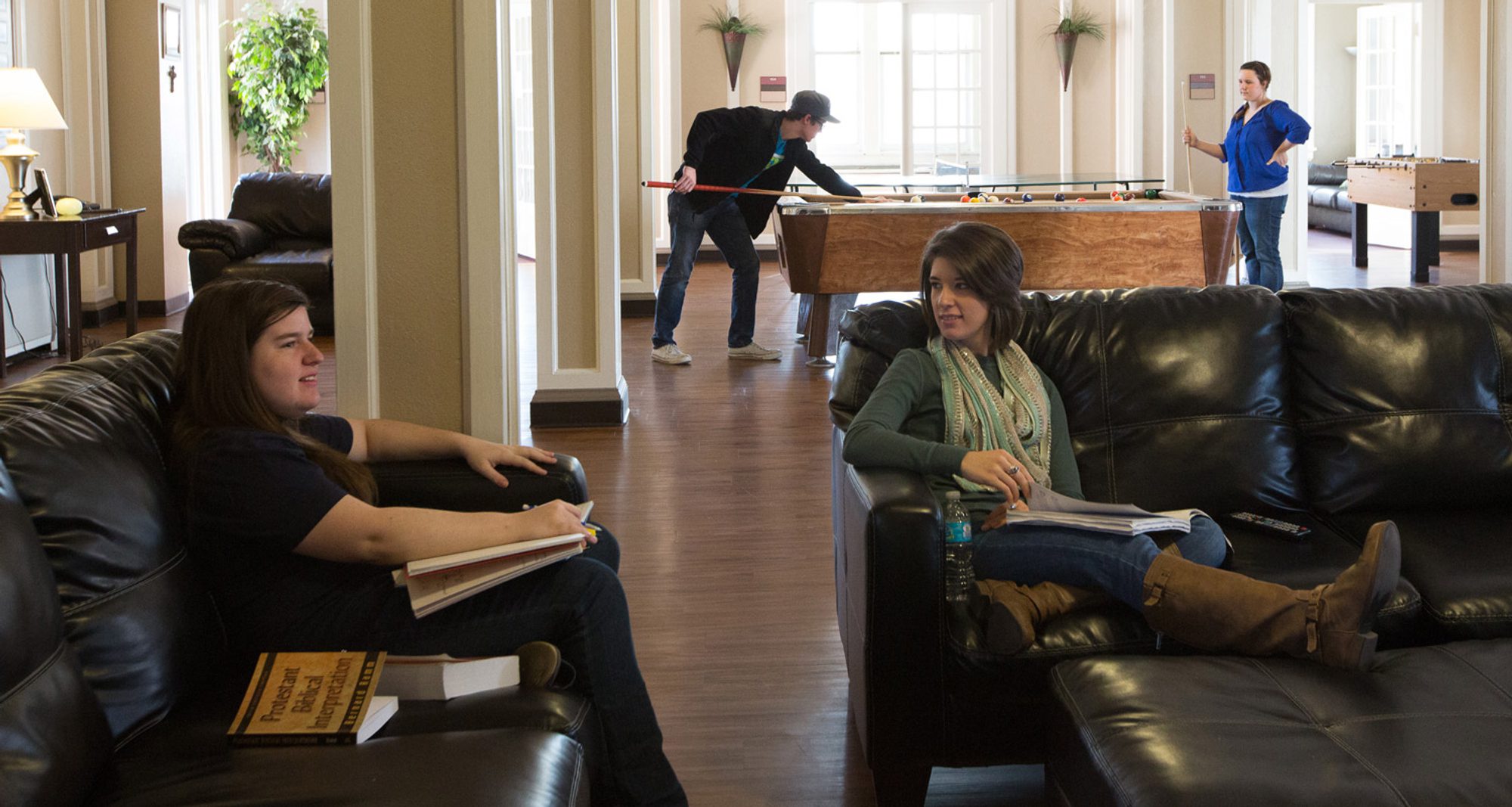 Students chatting with their RA in Burt Hall. Students chatting with their RA in Burt Hall.