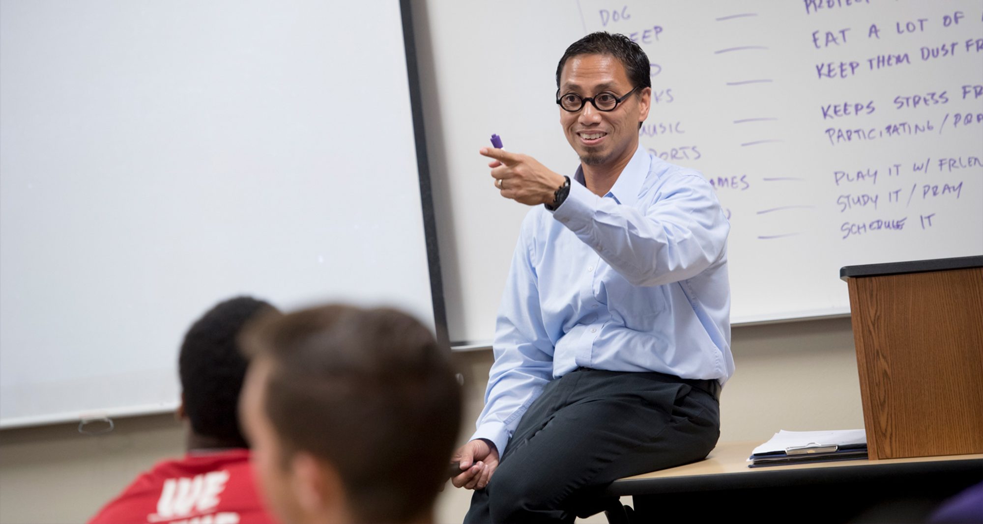 Dr. Lester Sombito lectures a class of EXSS students