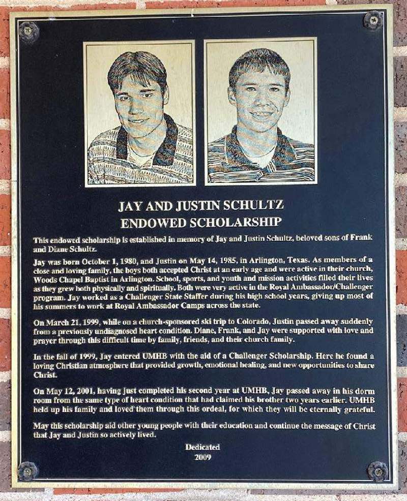 A plaque hangs on the Sanderford Administrative Complex in memory of Jay and Justin Schultz and the presidential endowed scholarship their parents created.